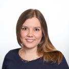 a picture of a woman in a dark blue shirt 